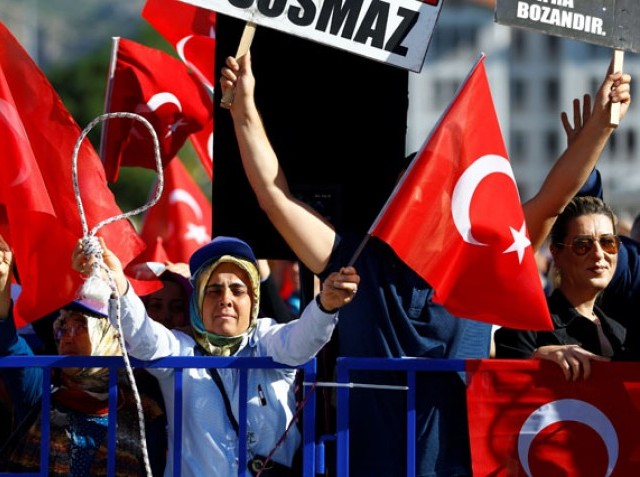 Image result for Turkey sentences 34 to life in jail over President Erdogan death plot