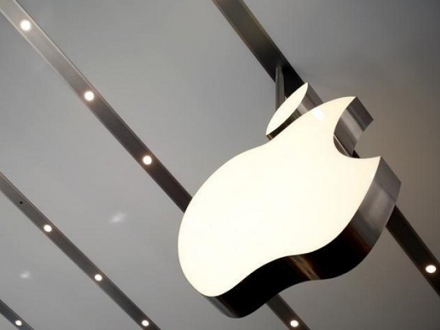 FILE PHOTO: The Apple logo is pictured inside the newly opened Omotesando Apple store at a shopping district in Tokyo June 26, 2014. 
PHOTO: REUTERS