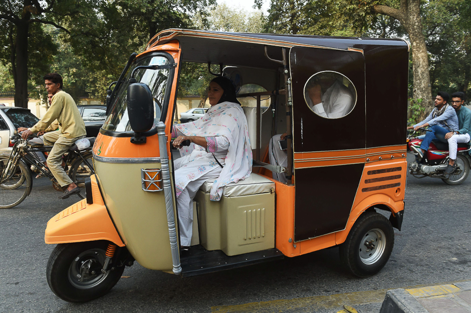 Pakistani women rides a rickshaw at a rally to rise women's awareness in Lahore. PHOTO: AFP