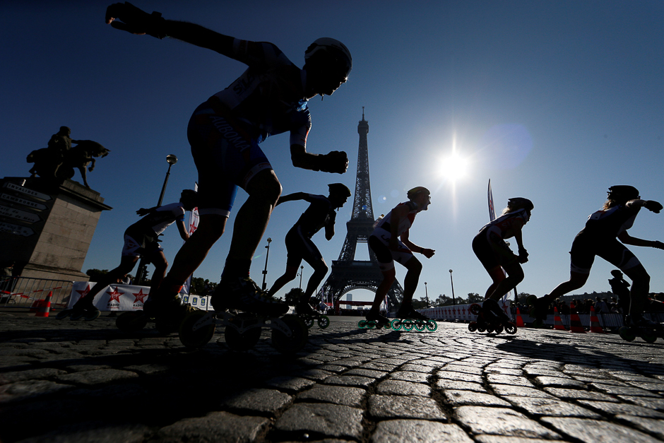 The skaters of the Paris rollers marathon pass in front of the Eiffel tower in Paris, France. PHOTO: REUTERS