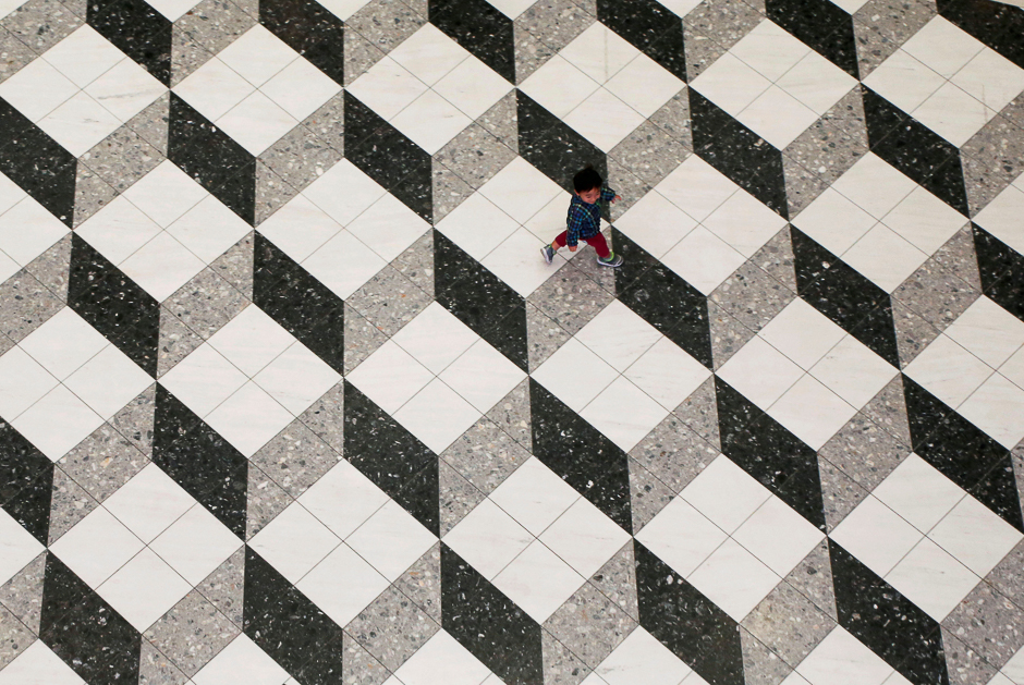 A boy walks at a shopping mall in Tokyo, Japan. PHOTO: REUTERS