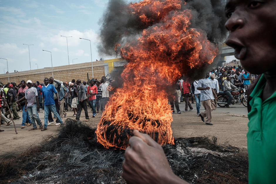 A fire has been set by demonstrators in Kisumu, during a rally to demand the removal of officials from national election oversight body. PHOTO: AFP