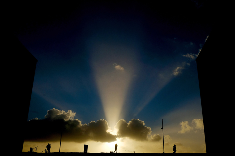 People enjoy windy weather with a walk along the river Weser in Bremerhaven, northern Germany. PHOTO: REUTERS