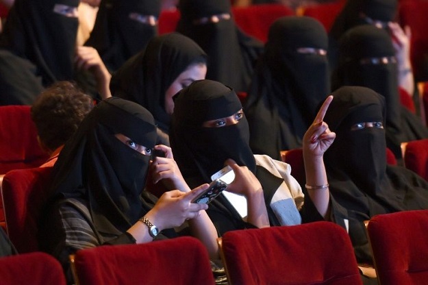 Saudi women attend a short film festival in Riyadh, on what could prove a precursor to an anticipatedl lifting of the kingdom's ban on cinemas. PHOTO: AFP