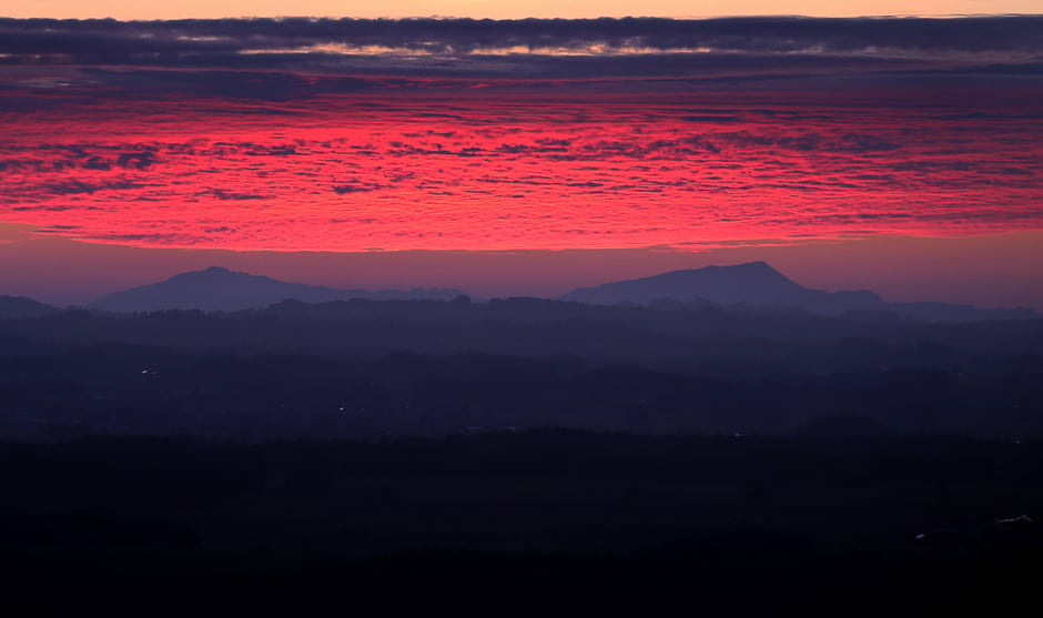 Red clouds are pictured at the sunset in the Alpine foothills in southern Germany. PHOTO: AFP