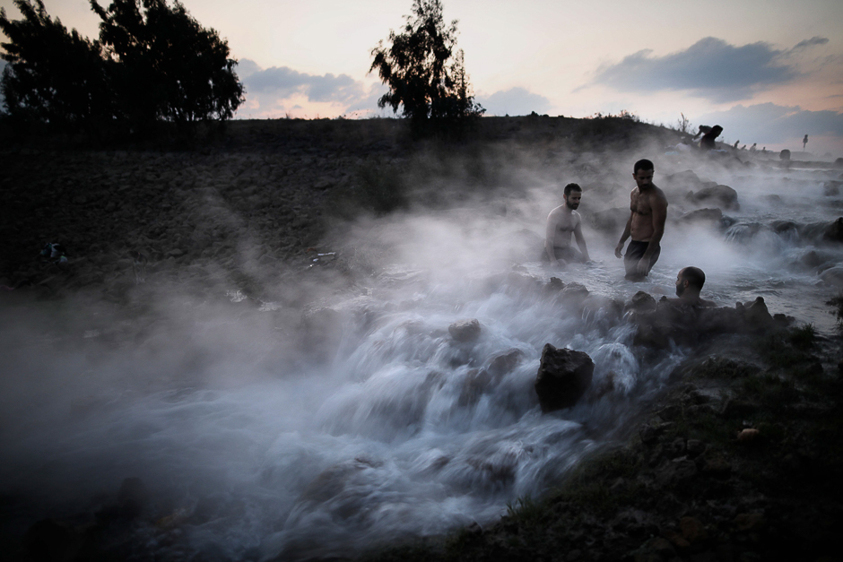 Israelis take a dip in a hot water pool in the northern part of in the Israeli-occupied Golan Heights, near the Shaal settlement. PHOTO: AFP