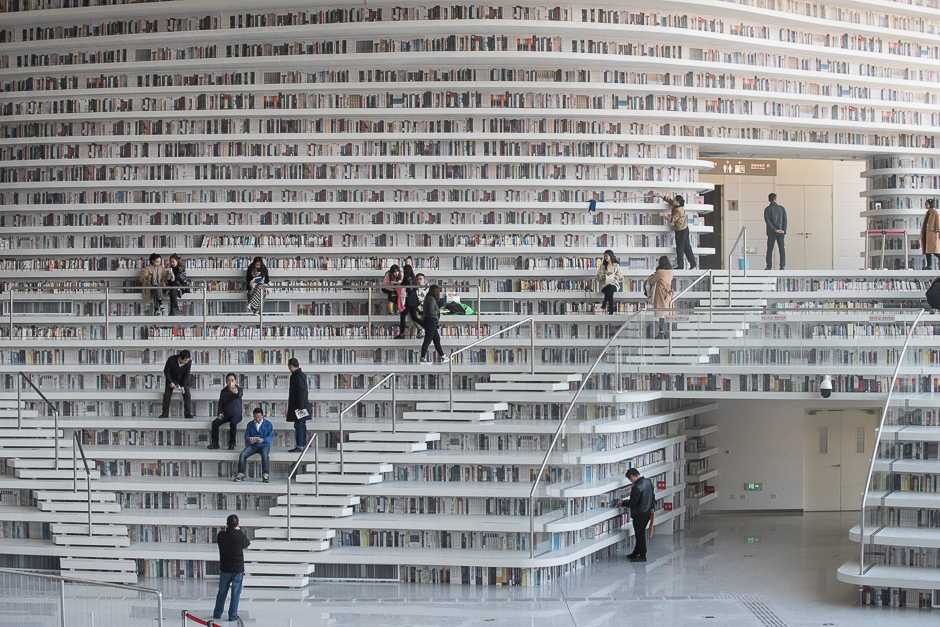 People visit the Tianjin Binhai Library in China. PHOTO: AFP