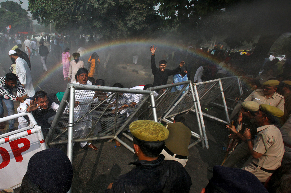 A rainbow forms as police use water cannon to disperse demonstrators during a protest, organised by India's main opposition Congress party in Chandigarh, India. PHOTO: REUTERS