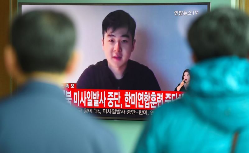 south koreans watch a television news showing a video footage of a man who claims he is kim han sol a nephew of north korea 039 s leader kim jong un at a railway station in seoul photo afp