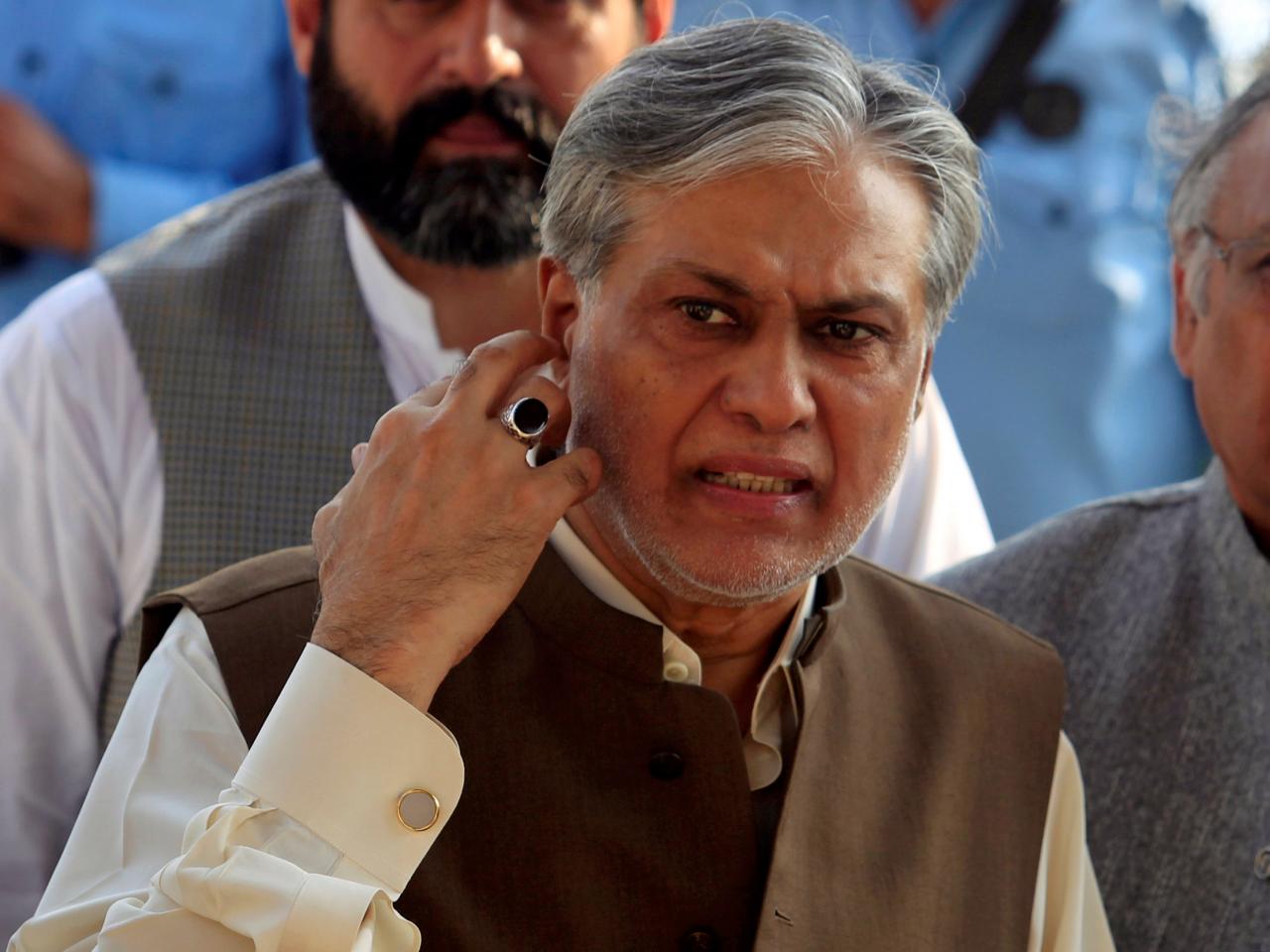 pakistans-finance-minister-ishaq-dar-is-seen-after-a-party-meeting-in-islamabad-2