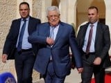 palestinian-president-mahmoud-abbas-walks-to-speaks-to-the-media-after-his-meeting-with-jordans-king-abdullah-at-the-royal-palace-in-amman