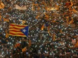 file-photo-protesters-hold-the-lights-of-their-mobile-phones-as-they-wave-estelada-flags-during-a-demonstration-called-by-pro-independence-associations-asking-for-the-release-of-jailed-catalan-activi