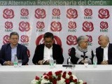 members-of-the-political-party-of-the-farc-look-on-during-the-presentation-of-their-candidates-in-bogota