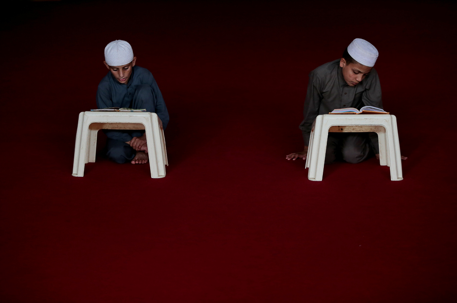 Students memorise the Quran at the Al-Nadwa Madrassa in Murree, Pakistan. PHOTO: REUTERS