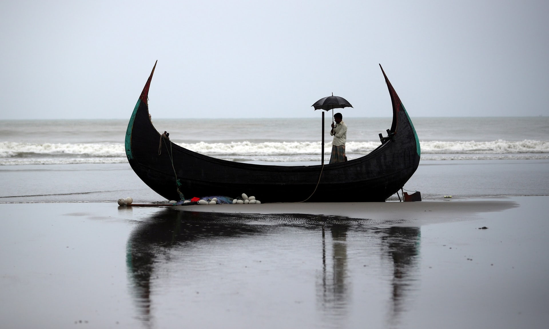 A boat which capsized carrying a group of Rohingya refugees fleeing from Myanmar, Bailakhali, Bangladesh. PHOTO: REUTERS