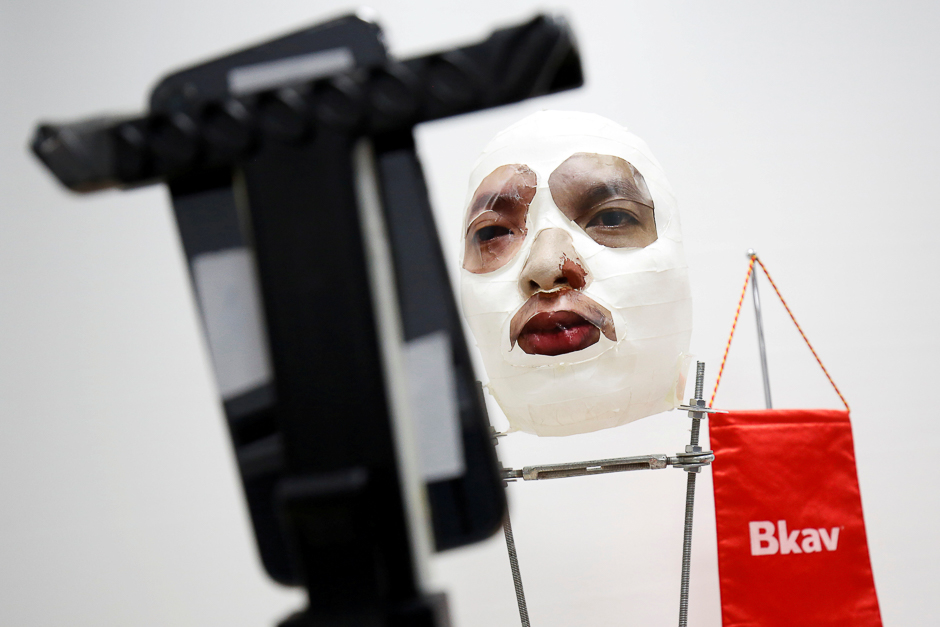 A 3D mask and an iPhone X are seen during a demonstration of recognition ID at the office of Bkav, a Vietnamese cybersecurity firm in Hanoi, Vietnam. PHOTO: REUTERS