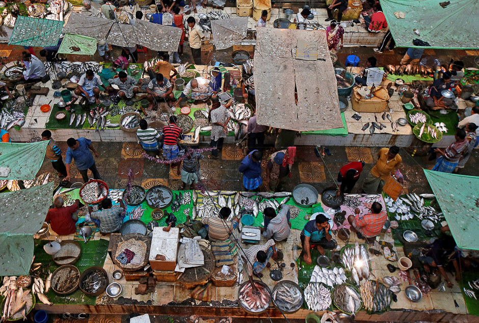 Vendors sell fish at a fish market in Kolkata, India. PHOTO: REUTERS