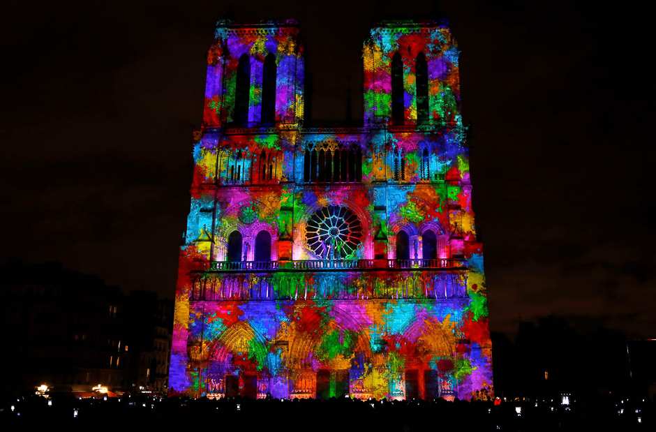 Notre-Dame de Paris Cathedral is illuminated in Paris during a light show as part of the Armistice Day commemorations marking the end of WWI (World War One). PHOTO: AFP