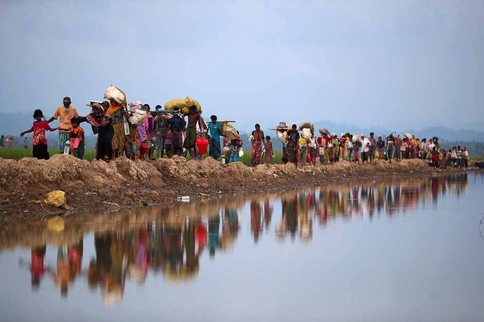 Rohingya refugees continue their way after crossing from Myanmar into Palang Khali, near Cox's Bazar, Bangladesh. PHOTO: REUTERS