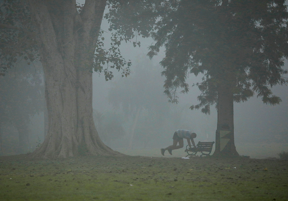 A man exercises in a park on a smoggy morning in New Delhi, India. PHOTO: REUTERS
