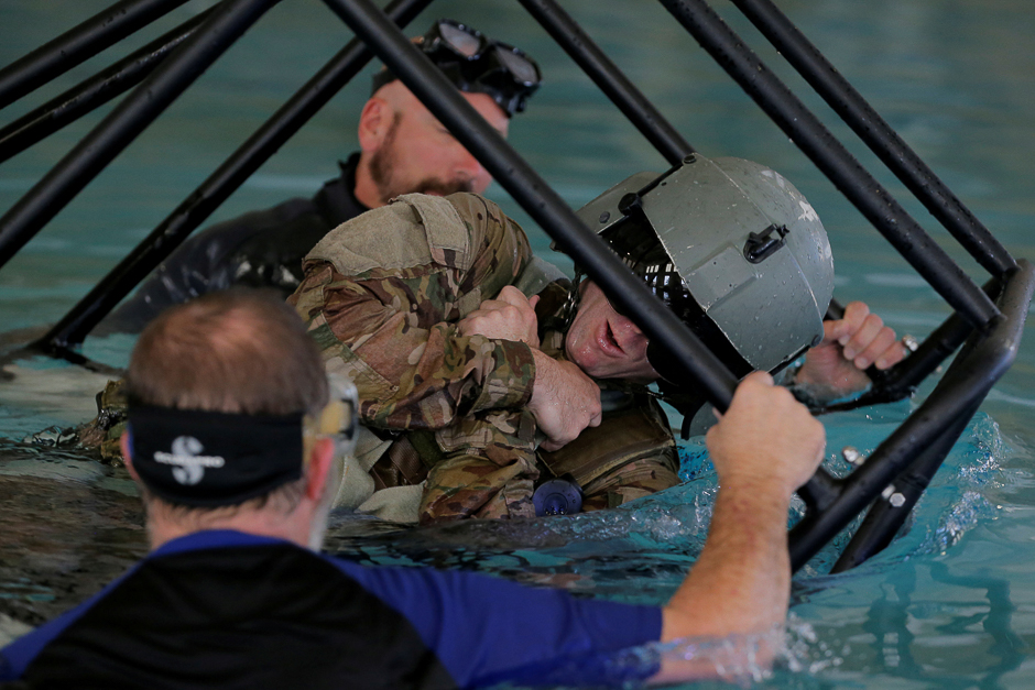 Soldiers from the 1st Armored Division, Combat Aviation Brigade, train on how to react if a helicopter crashes into the water following Hurricane Maria at Fort Bliss in El Paso, Texas, US. PHOTO: REUTERS