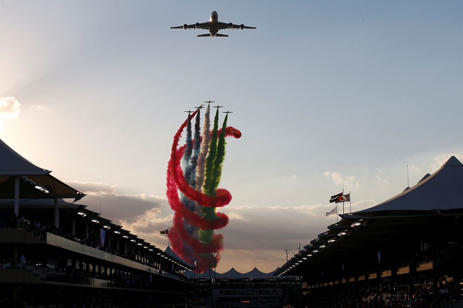 Formula One - Abu Dhabi Grand Prix - Yas Marina circuit, Abu Dhabi, United Arab Emirates General view as planes fly over the circuit before the race. PHOTO: REUTERS