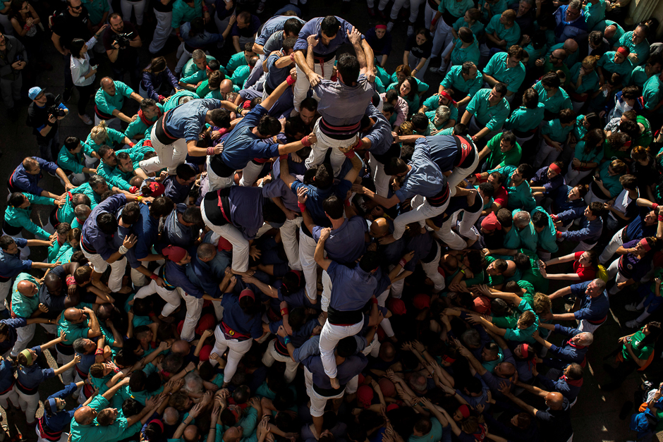 The group Colla els Capgrossos de Mataro form a human tower called 'Castell' during the All Saints Day in Vilafranca del Penedes town, near Barcelona, Spain. PHOTO: REUTERS