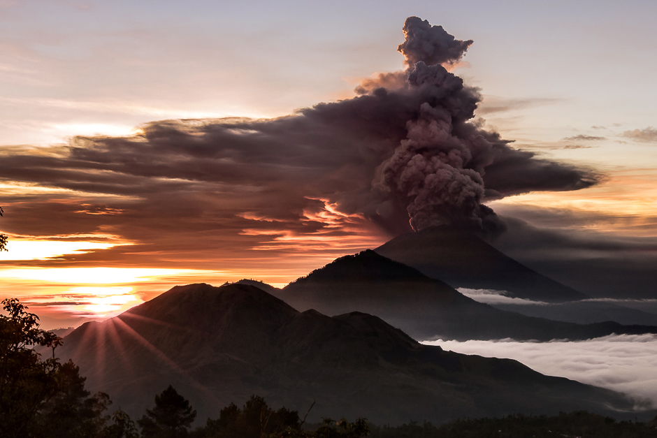 Mount Agung volcano is seen spewing smoke and ash in Bali, Indonesia. PHOTO: REUTERS