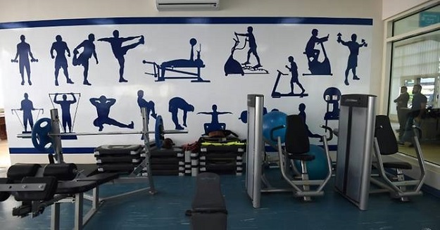 Men stand outside the gym of Riyadh's Mohammed bin Nayef Counselling and Care Centre. PHOTO: AFP