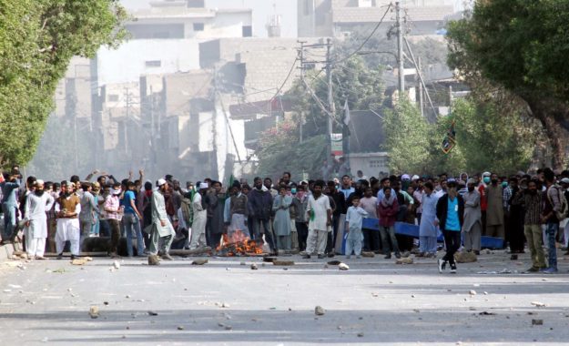 The protesters blocked the road and refused to move, according to the police. PHOTO: ATHAR KHAN/EXPRESS