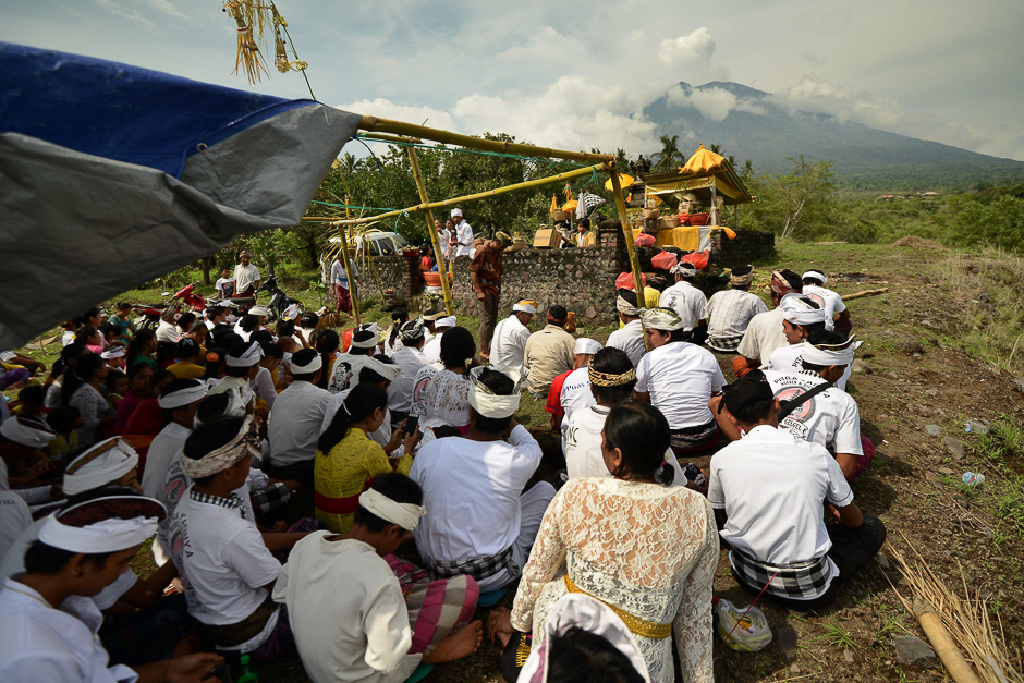 Balinese Hindu villages attend a ceremony to pray for the Mount Agung volcano to stop erupting at a temple at Kubu sub-district in Karangasem Regency on Indonesia's resort island of Bali. PHOTO: AFP