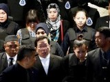 indonesian-siti-aisyah-and-vietnamese-doan-thi-huong-who-are-on-trial-for-the-killing-of-kim-jong-nam-the-estranged-half-brother-of-north-koreas-leader-are-escorted-as-they-revisit-the-kuala-lump