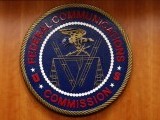 the-federal-communications-commission-fcc-logo-is-seen-before-the-fcc-net-neutrality-hearing-in-washington