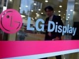 file-photo-a-man-walks-out-of-the-headquarters-of-lg-display-in-seoul