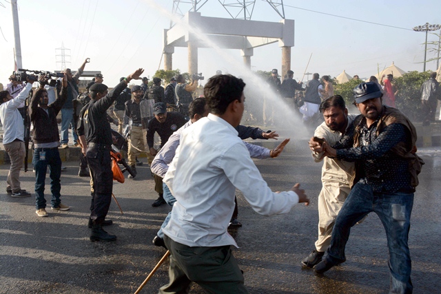 The protesters were sprayed by water cannons and pelted with teargas. PHOTO: MOHAMMAD AZEEM/EXPRESS