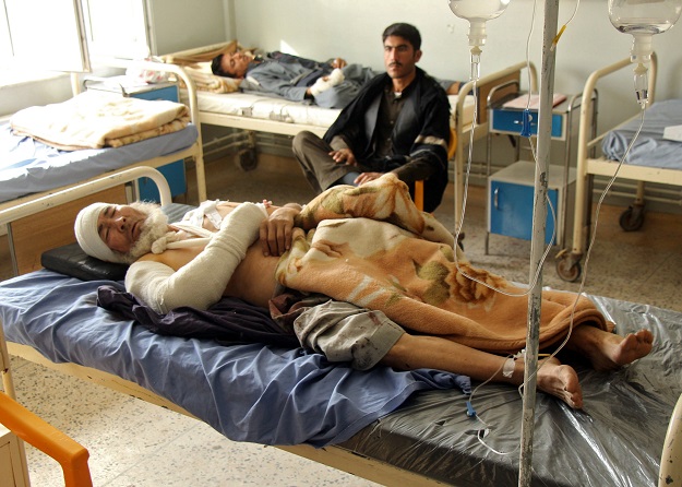 An Afghan man receives treatment at a hospital after an air strike in Kunduz province, Afghanistan. PHOTO: REUTERS