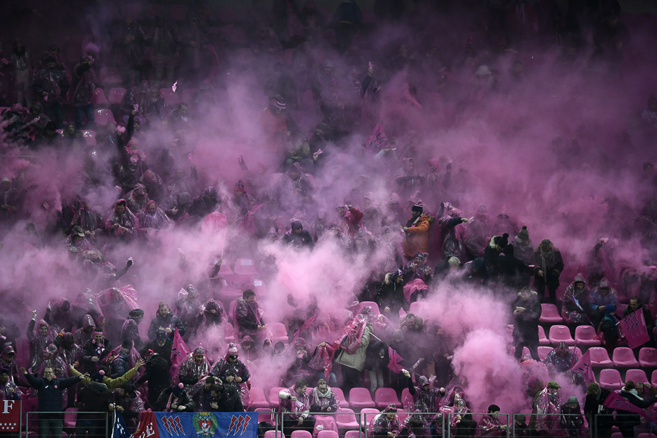 Stade Francais' supporters cheer prior to the French Top 14 Rugby union match between Stade Francais and Racing 92, at the Jean Bouin stadium in Paris. PHOTO: AFP