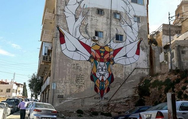 Graffiti in Jordan's capital is increasingly drawing admiration from some locals and visitors. PHOTO: AFP