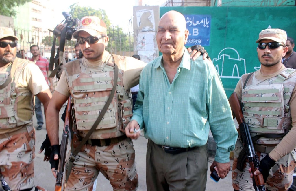 File photo of Dr Hasan Zafar Arif being arrested by Rangers from outside the Karachi Press Club on October 22, 2016. PHOTO: PPI
