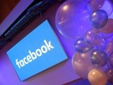file-photo-balloons-are-seen-in-front-of-a-logo-at-facebooks-headquarters-in-london