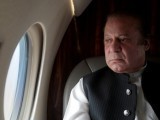 pakistani-prime-minister-nawaz-sharif-looks-out-the-window-of-his-plane-after-attending-a-ceremony-to-inaugurate-the-m9-motorway-between-karachi-and-hyderabad-3-2-3-2-2-2-2-2-2-2-2-2
