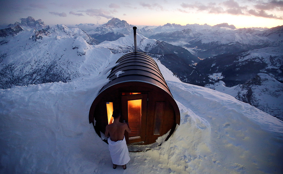 A person enters in a sauna on the peak of Mount Lagazuoi in Cortina D'Ampezzo, Italy. PHOTO: REUTERS