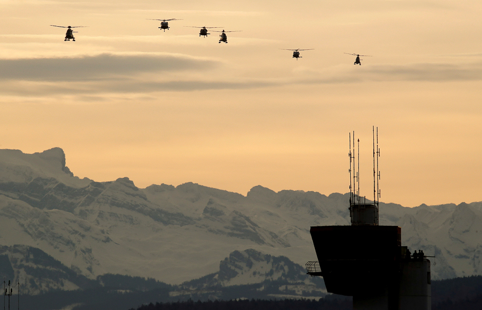 Helicopters approach to land before the arrival of US President Donald Trump at Zurich airport, Switzerland. PHOTO: REUTERS