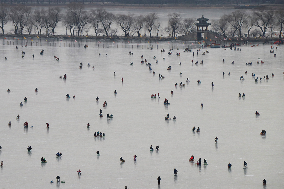 People visit a skating rink on the frozen Kunming Lake at the Old Summer Palace in Beijing, China. PHOTO: REUTERS