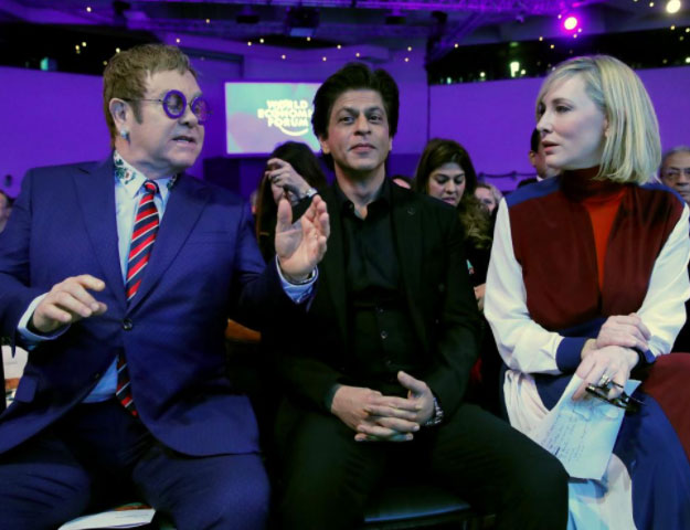 Actor Cate Blanchett and actor Shah Rukh Khan and singer Elton John pose for the media PHOTO: REUTERS