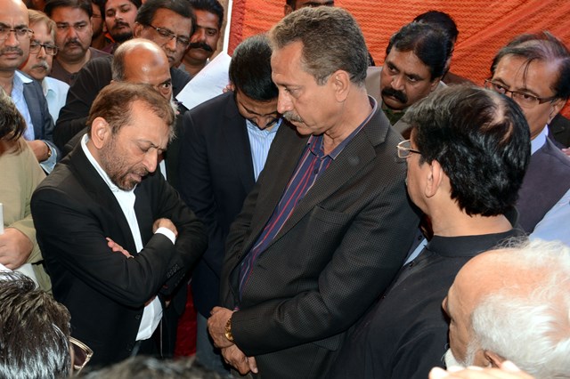 faisal subzwari cries as he and mayor wasim akhtar come face to face with farooq sattar who is heading the pib colony faction photo athar khan express