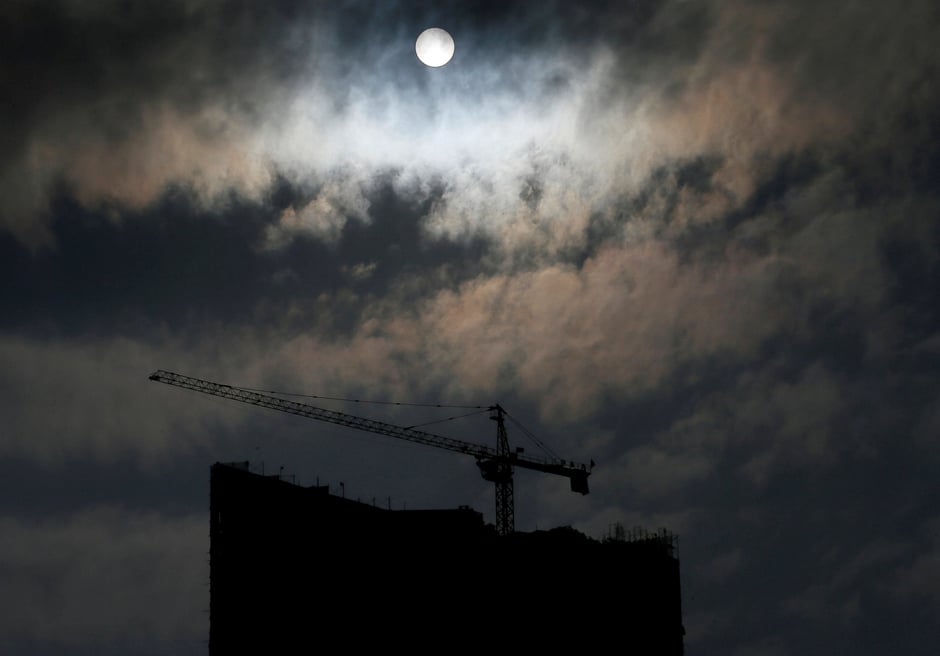 A construction site is seen as the sun rises in the morning in Colombo, Sri Lanka. PHOTO: REUTERS