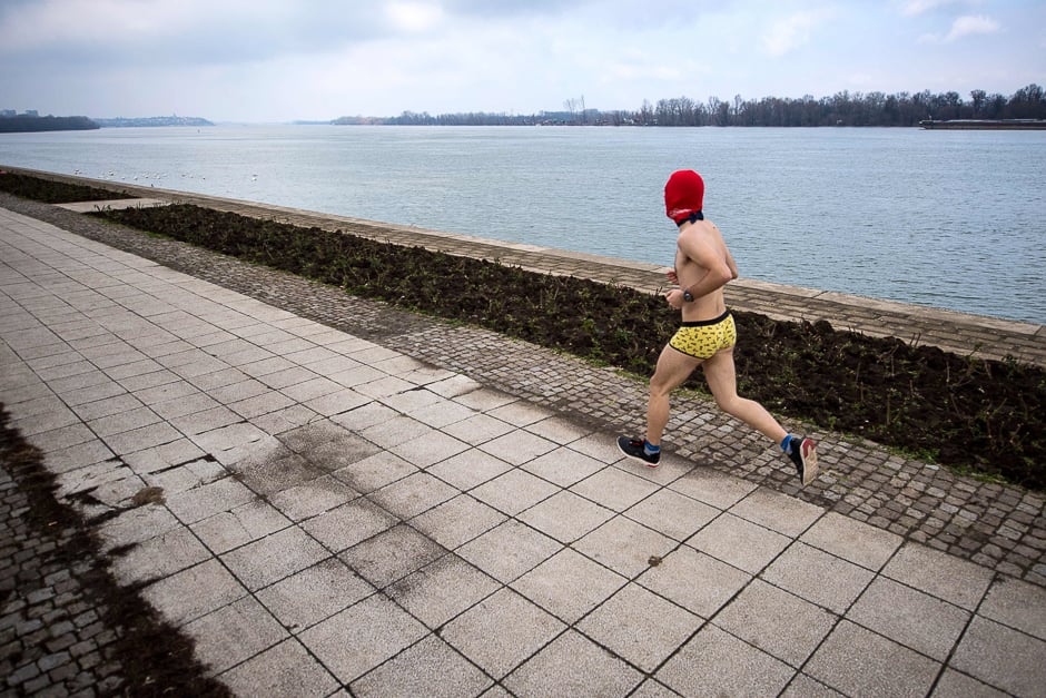 A runner takes part in an Underpants Run on the banks of Danube river in Belgrade while outside temperature approaches zero degree Celsius. PHOTO: AFP