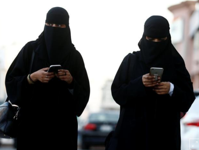 Women use the Careem app on their mobile phones in Riyadh, Saudi Arabia. PHOTO: Reuters
