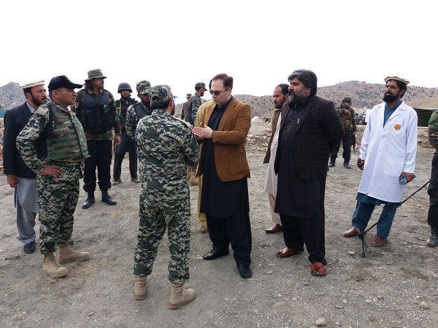 Political Administration and Army officers welcome TDPs returning from Afghanistan. PHOTO: EXPRESS